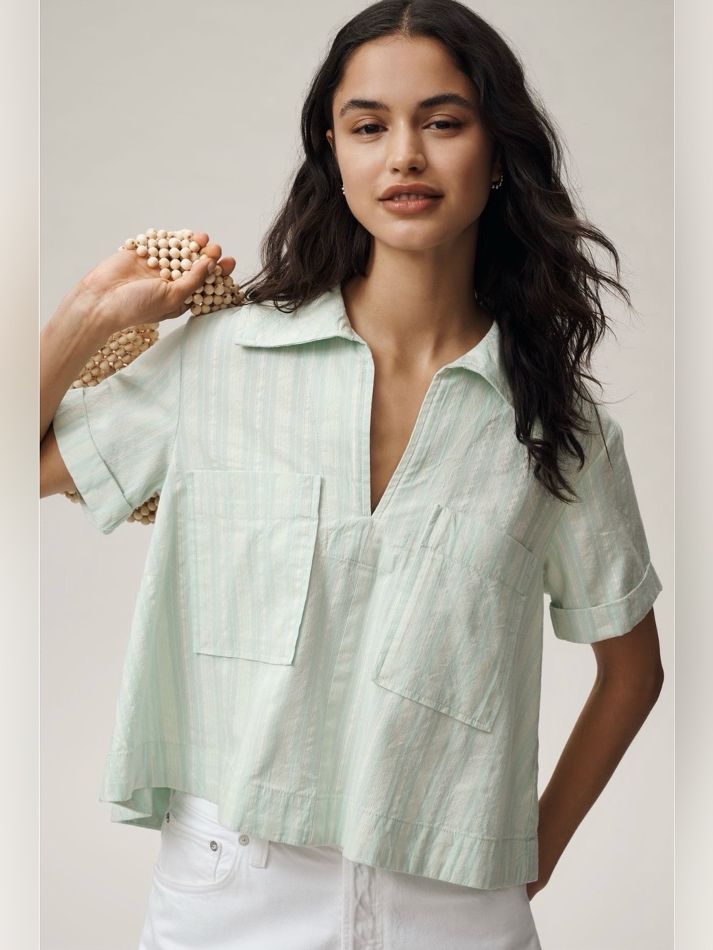 Anthropologie Maeve short-sleeve swing top featuring a relaxed fit - Picture 1 of 9